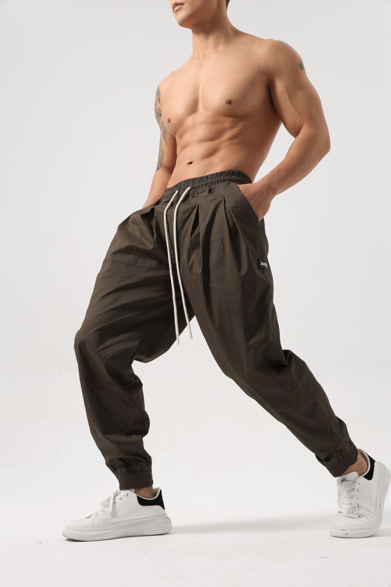 Pantalones deportivos holgados de algodón para hombre