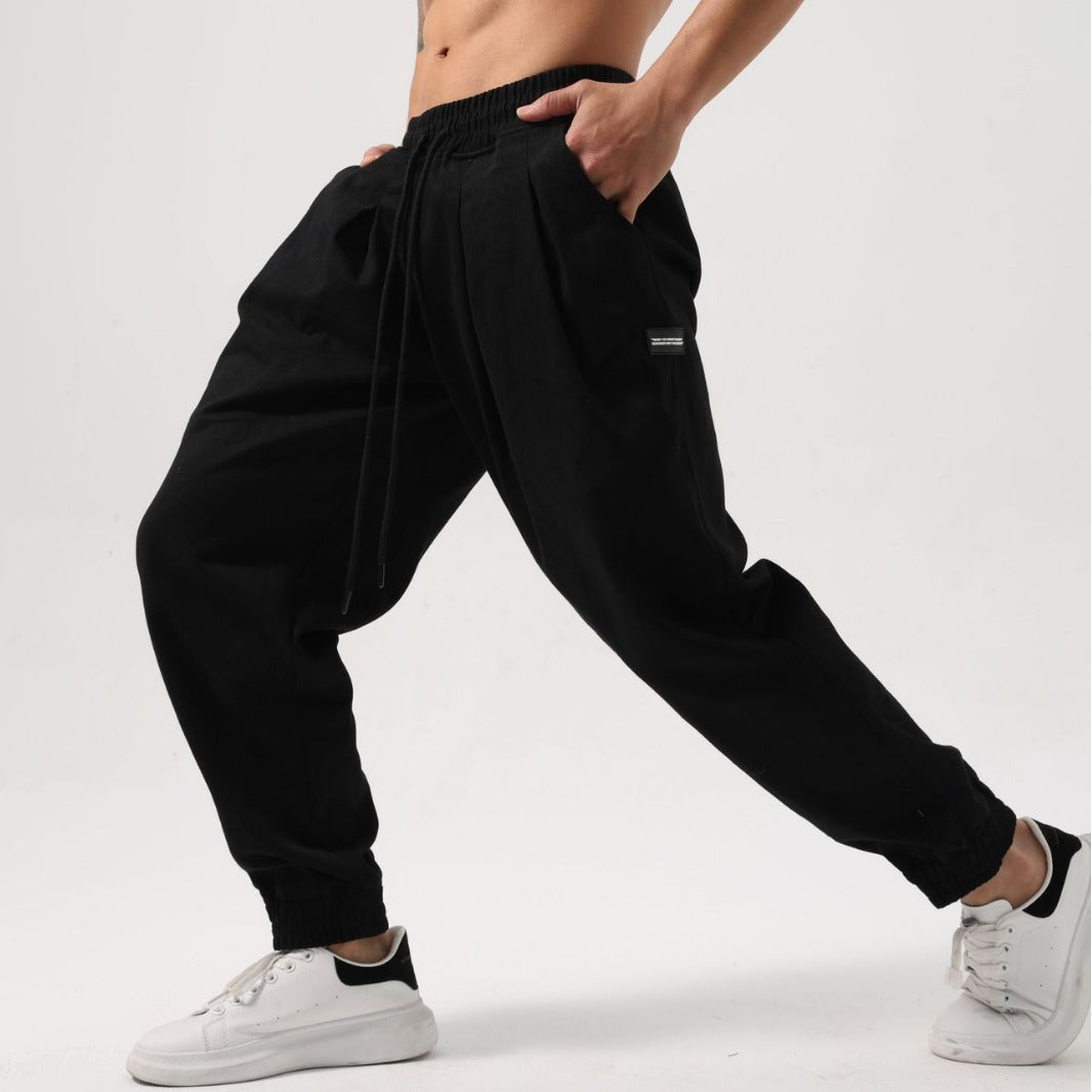 Pantalones deportivos holgados de algodón para hombre
