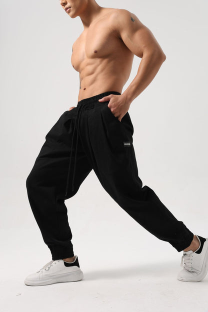 Pantalones deportivos holgados de algodón para hombre