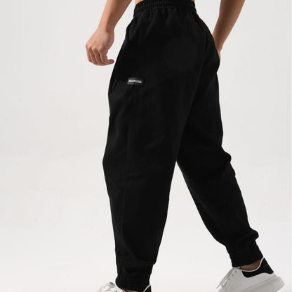 Pantalones deportivos holgados de algodón para hombre